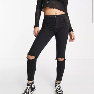 Topshop Petite Jamie jeans with knee rips in black